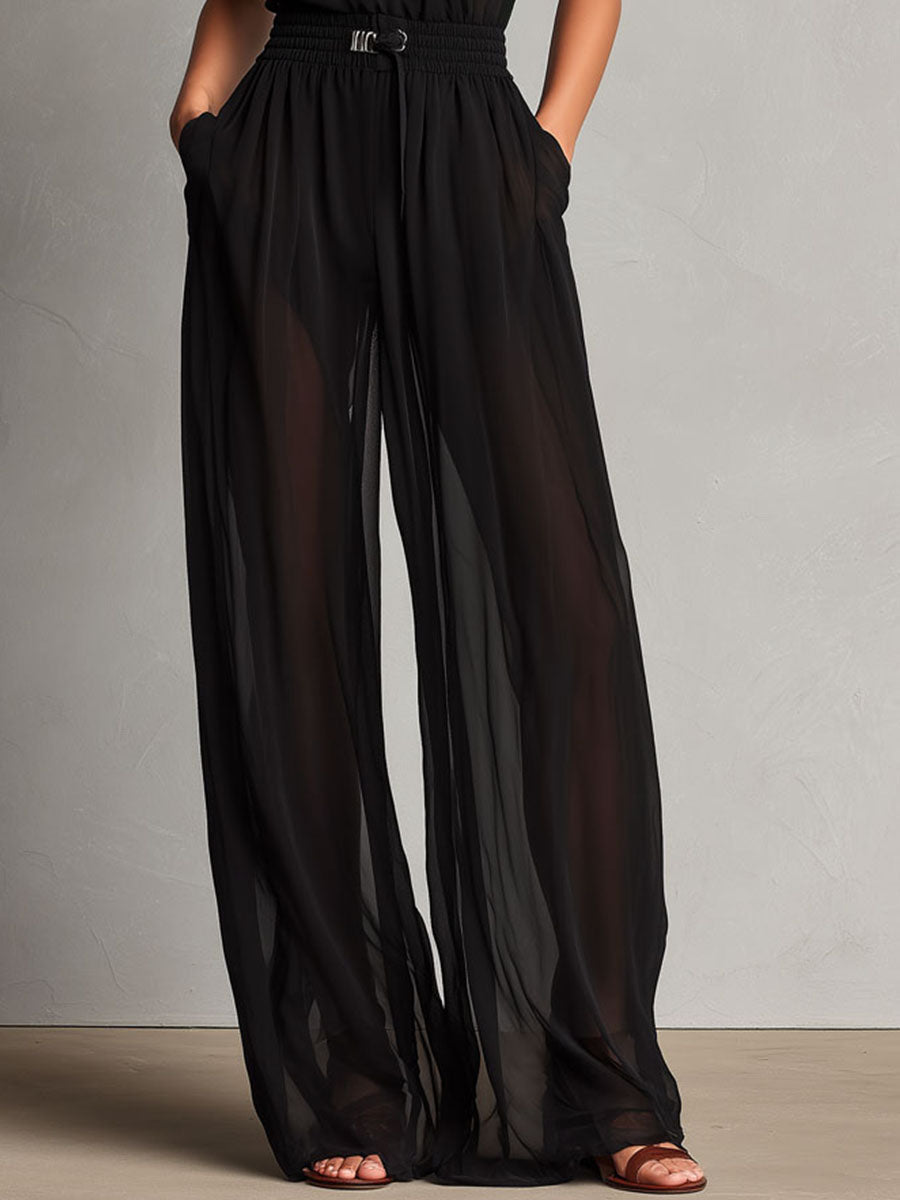 Elegant Black Sheer High-Neck Flare Jumpsuit