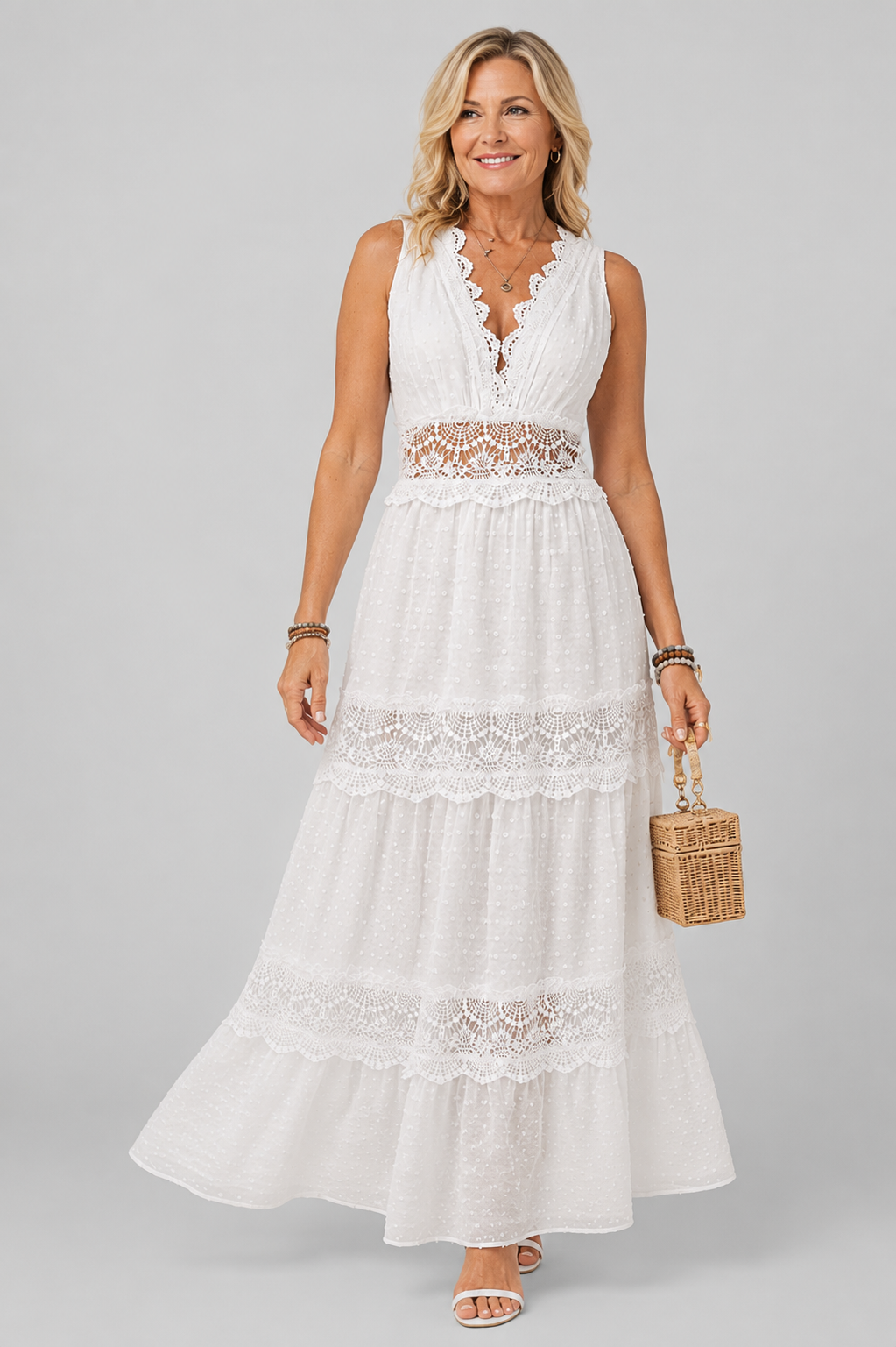 Sleeveless dress with V-neck and lace inserts