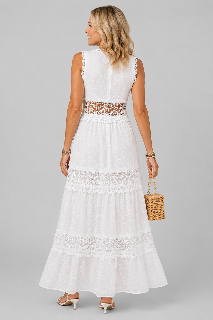 Sleeveless dress with V-neck and lace inserts